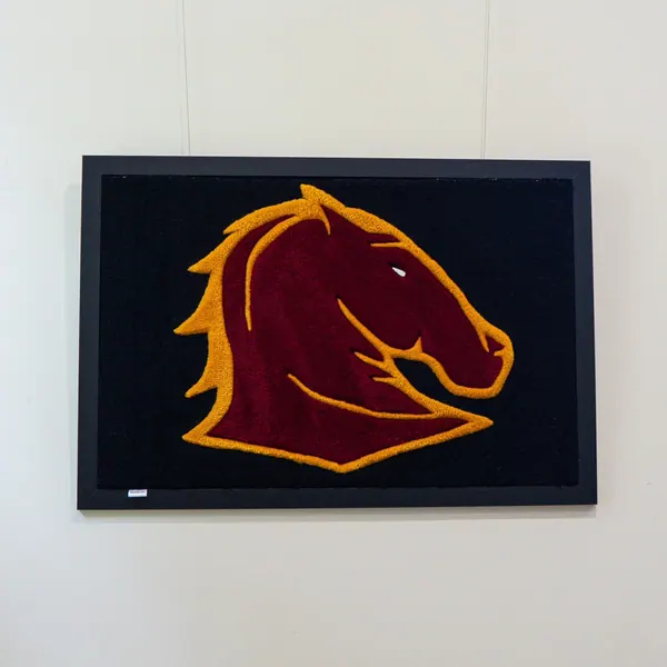 Alvirne High School Bronco, a hand-tufted rug by Made By Juice