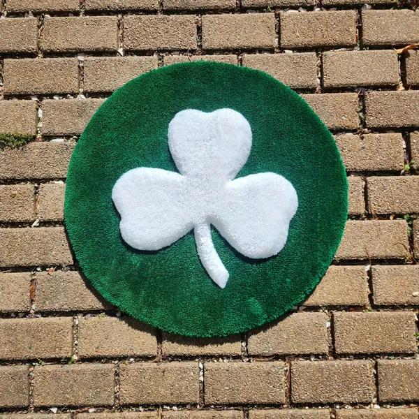 Celtics clover, a hand-tufted rug by Made By Juice
