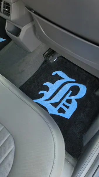 Custom car mats, a hand-tufted rug by Made By Juice