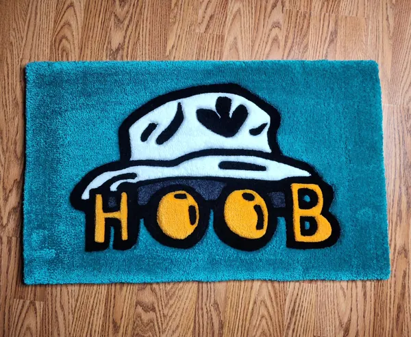 Hoob, a hand-tufted rug by Made By Juice