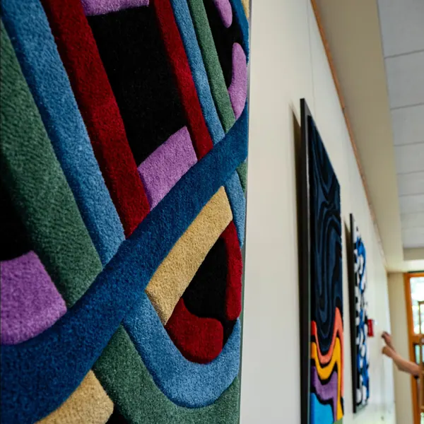 Library show wall, a hand-tufted rug by Made By Juice