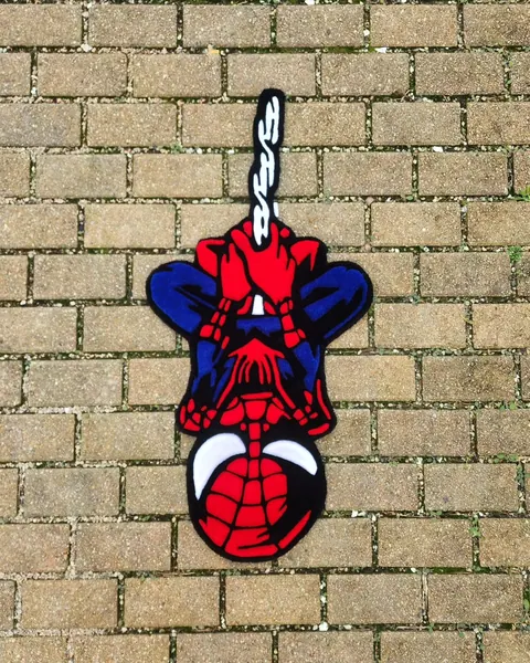 Spider-Man, a hand-tufted rug by Made By Juice